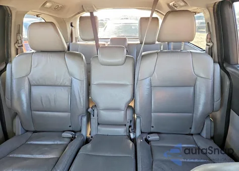 2012 Honda Odyssey Touring z USA, uszkodzony, nr VIN 5FNRL5H94CB076776